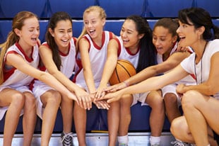 volleyball team celebrating