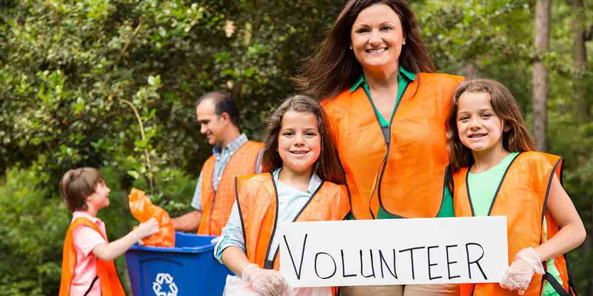 volunteer group picking up trash