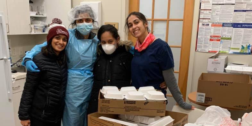 photo of healthcare workers with food delivery