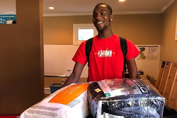 teen with care package supplies