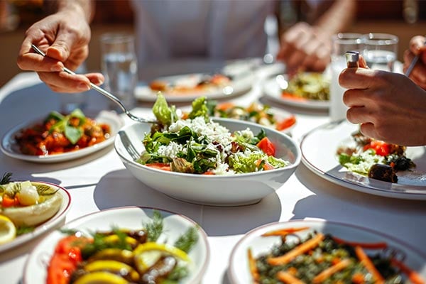 plates on table for potluck