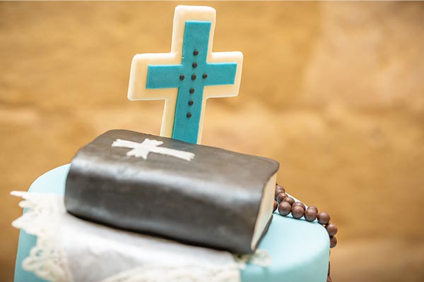 cake and bible for first communion