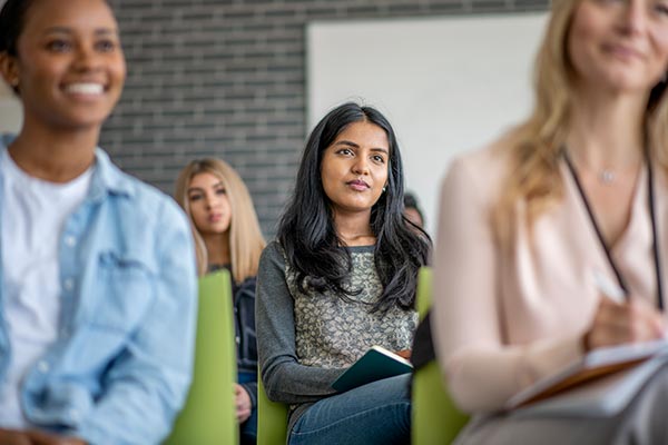 college freshmen sitting in classroom