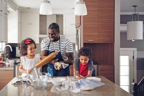 family having fun baking and cooking in kitchen