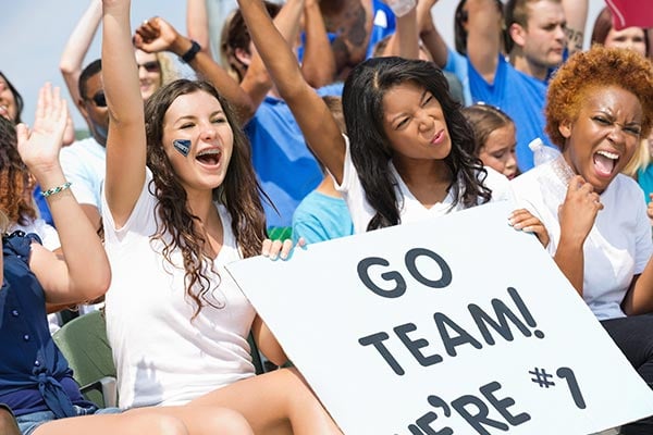 teens cheering celebrating senior spirit week