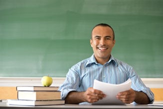teacher in classroom conference