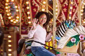 girl on carousel