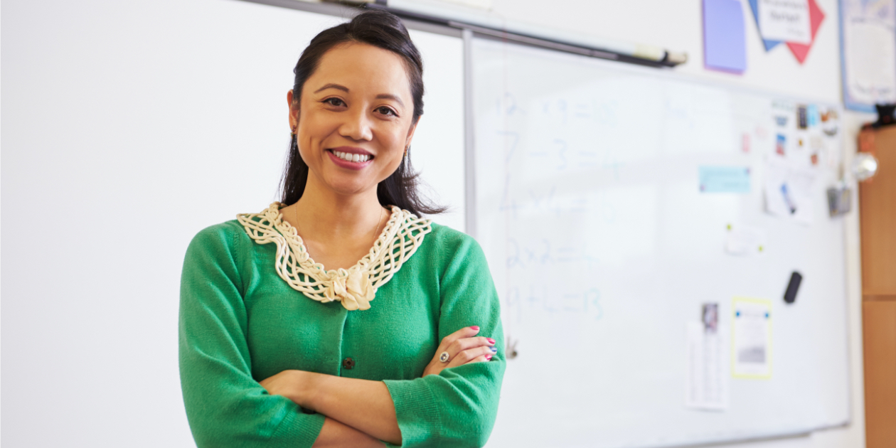 teacher standing in classroom