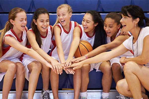 Women's sports teams develop support system with big and little