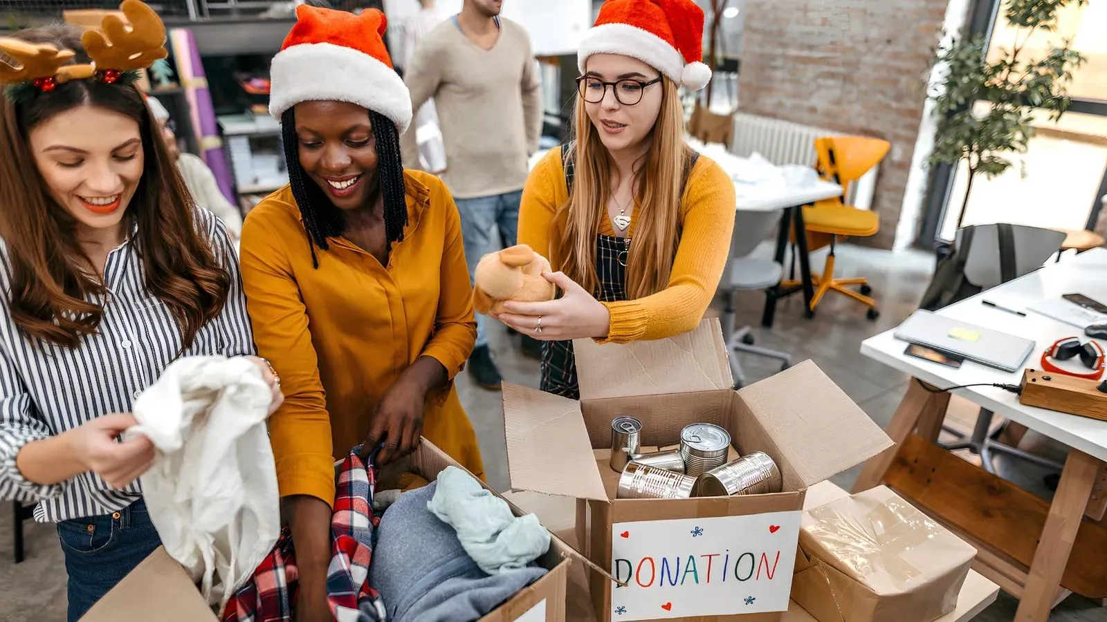 people volunteering at christmas food bank