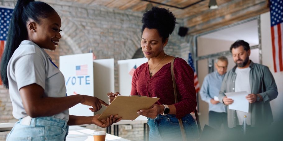 Poll worker at voting location