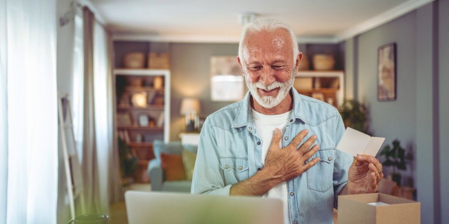 man receiving thank you card